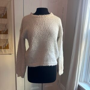 Soft and fluffy white sweater from Yet Again.